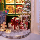 The Christmas tree with presents in Robotime Santa's Toy Shop