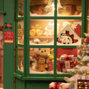 Details of the store window of the Robotime Santa's Toy Shop