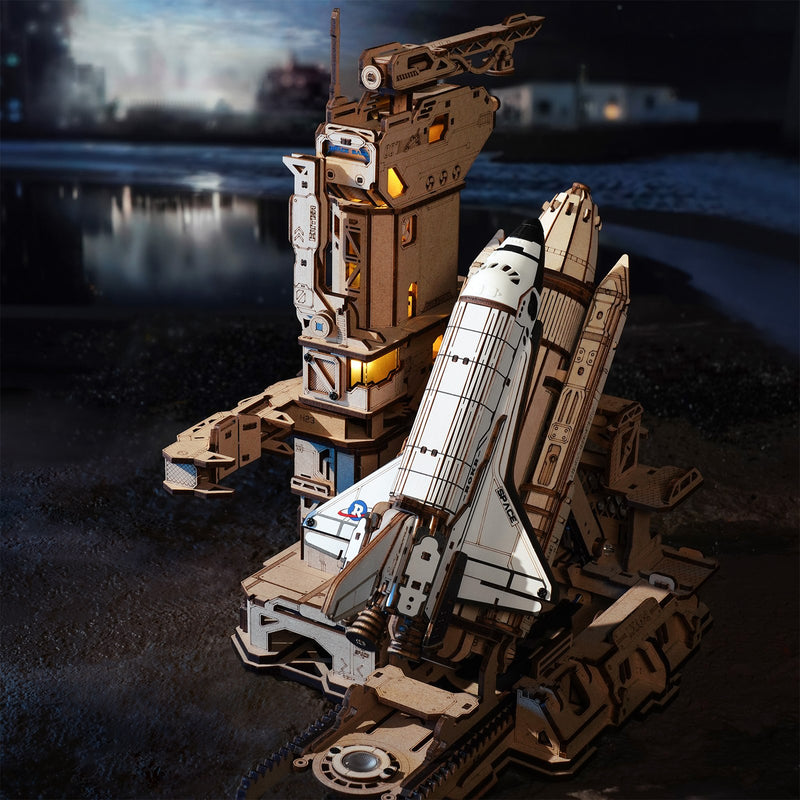 Atmospheric presentation of the Robotime Space Shuttle, wooden construction set of a spacecraft on a launch platform