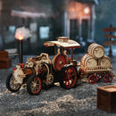 Atmospheric presentation of the Robotime Steam Engine, wooden construction kit of a vintage steam vehicle with trailer
