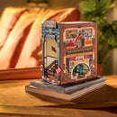 Side view of the Robotime Street Scene book nook, with a clear view of the recess on the side containing a subway station