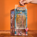 Demonstration of the dust sheet that slides in front of the opening of the Robotime Street Scene book nook