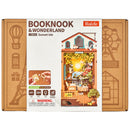 Front of package of the Robotime Sunset Isle, building kit for a book nook featuring a sunset at a beautiful vacation destination