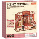 Front of package of the Robotime Sweet Chocolate Shop, construction kit for a miniature house of an old-fashioned chocolate shop