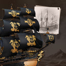 Bow and sails of the Robotime Seahorse Barque with a sketch of a sailing ship in the background