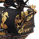 Stern of the Robotime Seahorse Barque, black wooden sailing ship with golden details