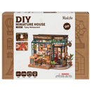 Front of package of the Robotime Tipsy Restaurant, cozy miniature restaurant in an old-fashioned style