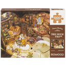 Front of package of the Robotime Tree House Tale, 1,000-piece jigsaw puzzle of the dimly lit interior of a tree house, filled with books and decorations