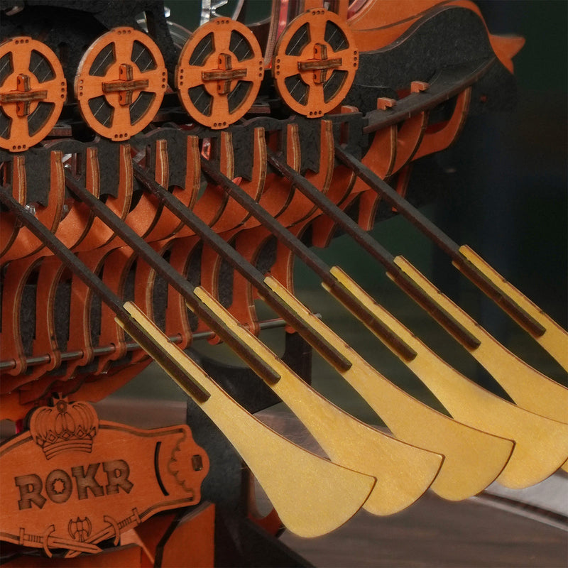 A set of moving oars on the side of the Robotime Viking Dragon Ship