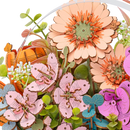 Close-up of the tulips, gerberas, sakura, and orchids in the Robotime Wooden Blooming Book